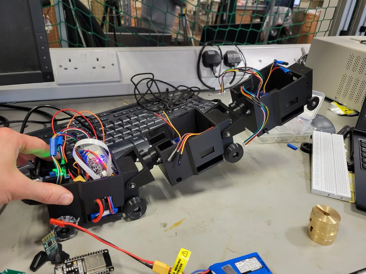 Three pipe-inspection robots linked together
